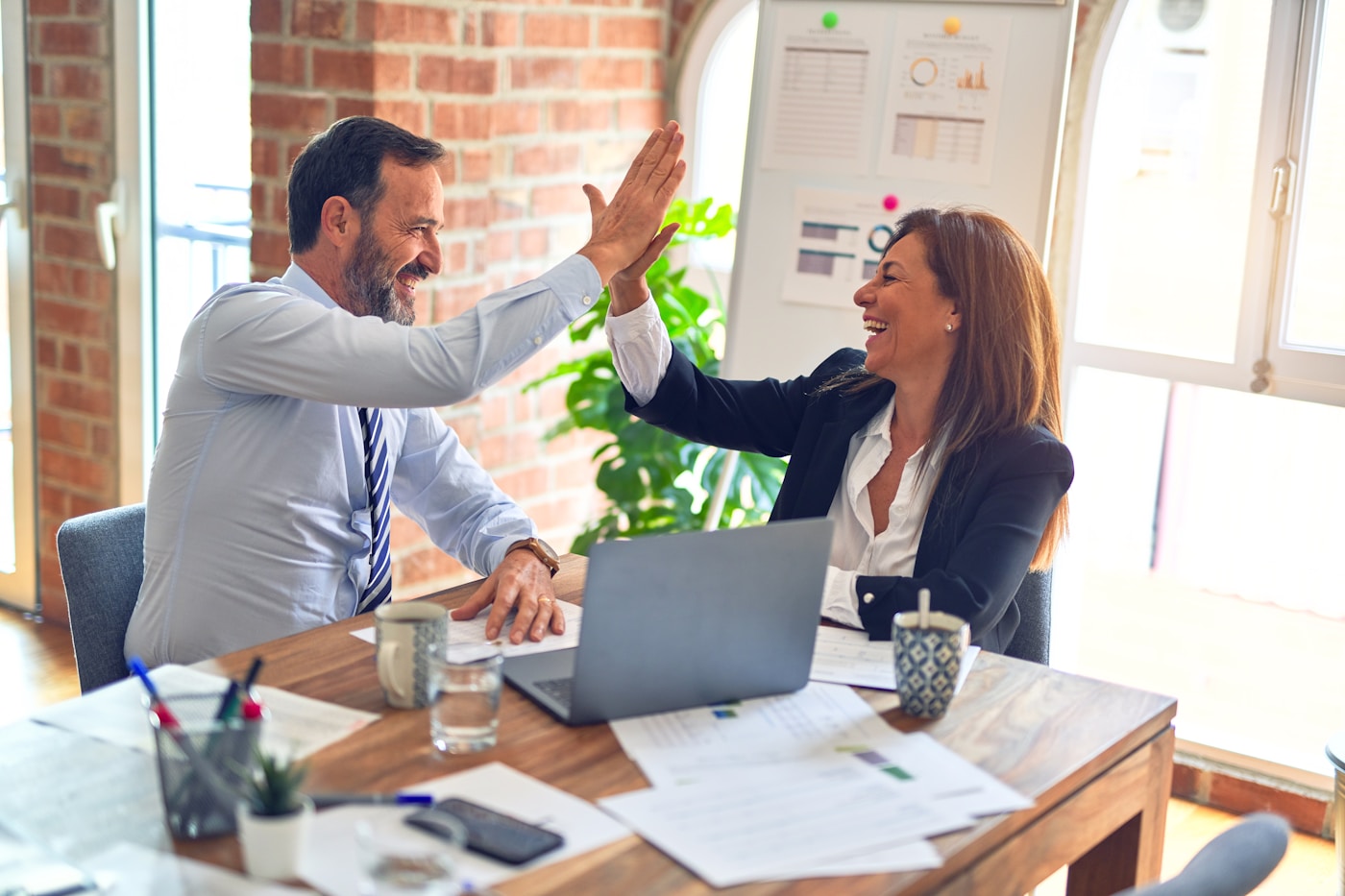 Launch performance review with campaign analytics on screen